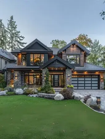 Elegant modern mountain home with stone facade